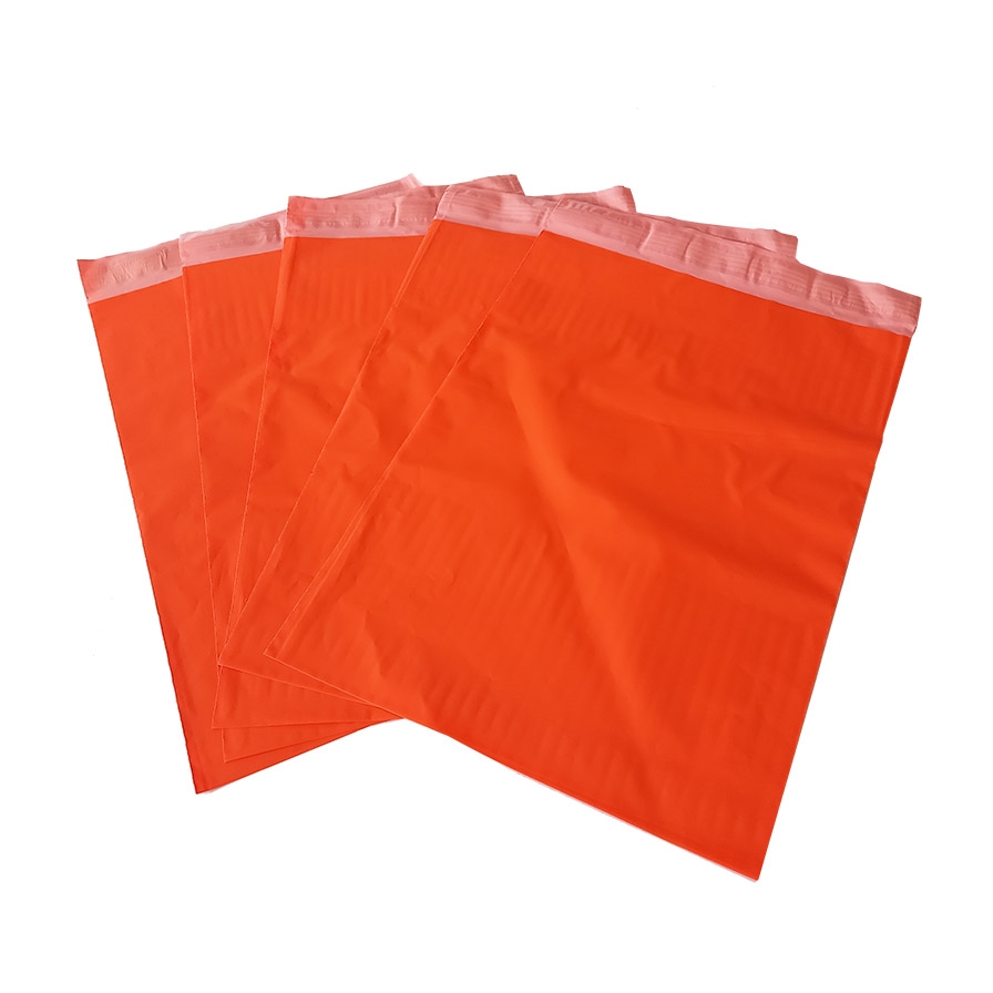 Plastové obálky oranžové  poštovní 250x350+50 mm
